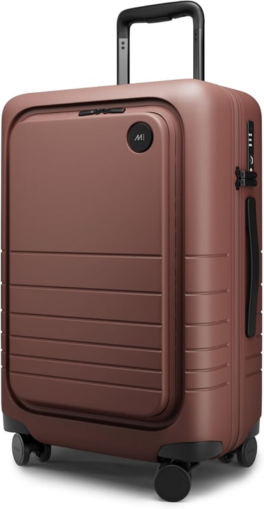 Monos Carry-On Pro hardside spinner in terracotta, front view with the laptop pocket closed