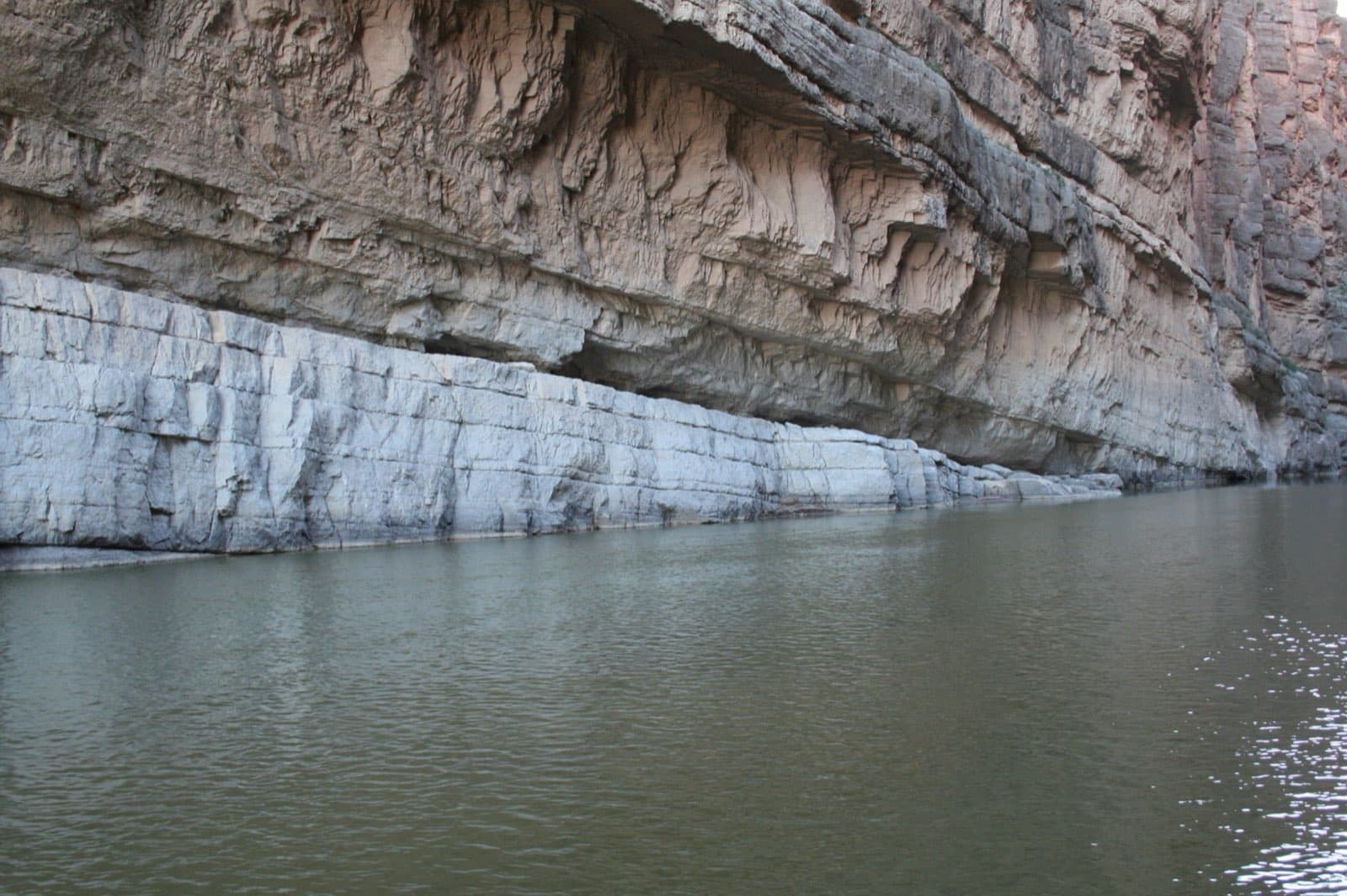 Tilted rock layers in the towering limestone walls of Santa Elena Canyon, carved by the Rio Grande, in Big Bend National Park, Texas.