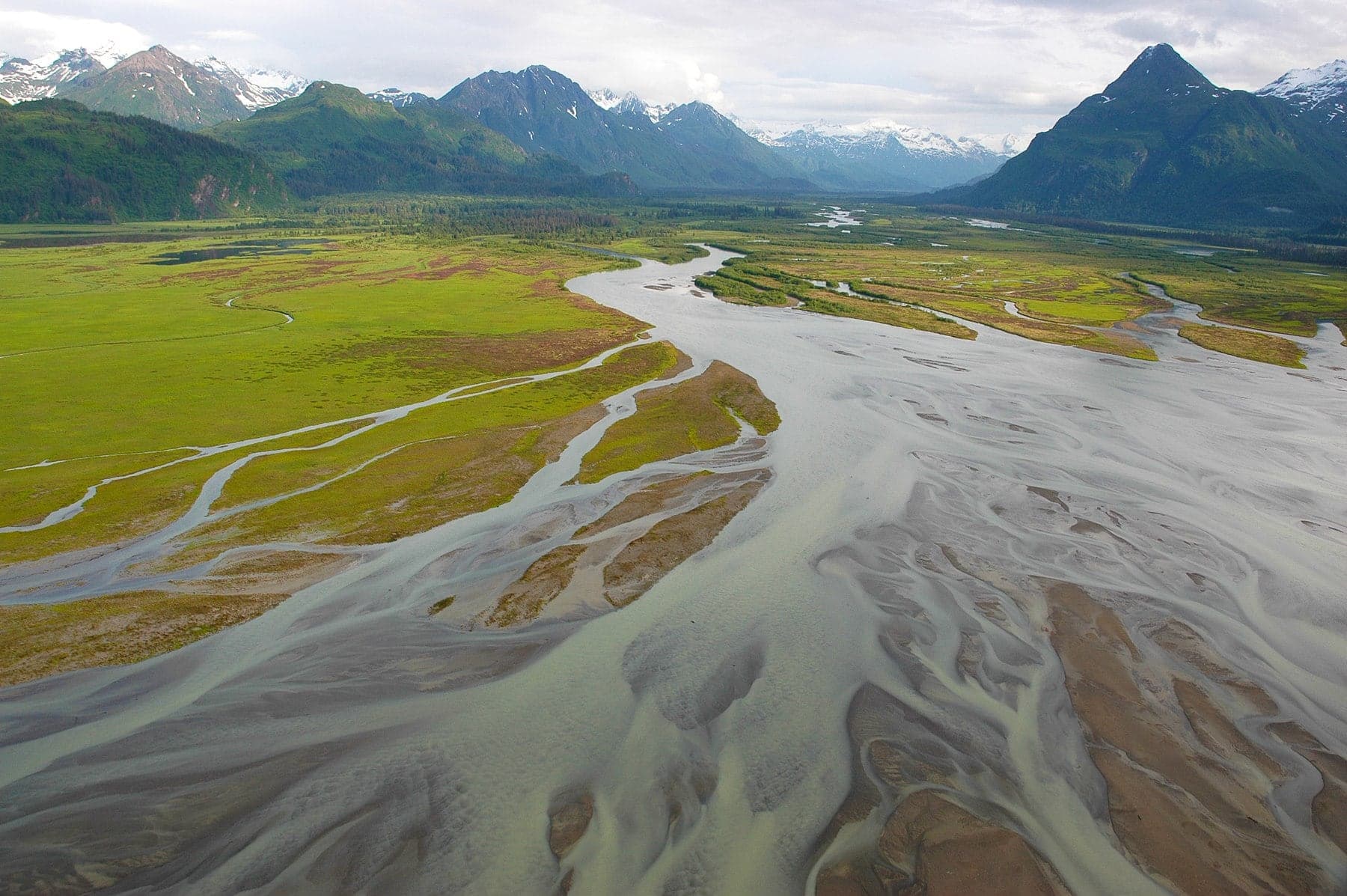 West Glacier Creek delta flowing into tidal flats below mountains