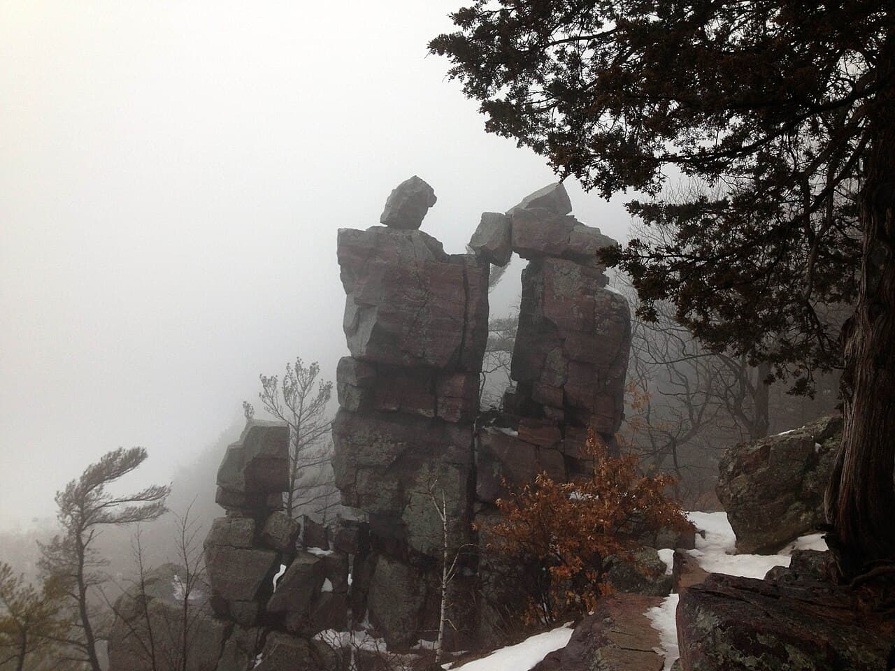 Fog lifting across the quartzite bluffs at Devil's Lake State Park