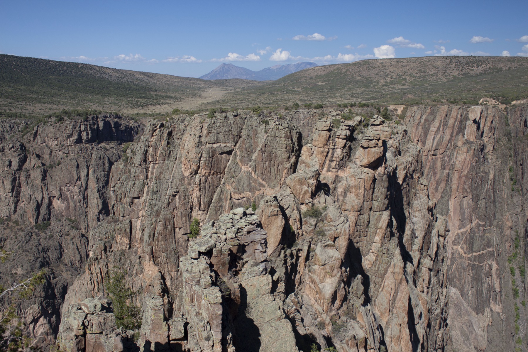 A dark canyon view from a rim overlook