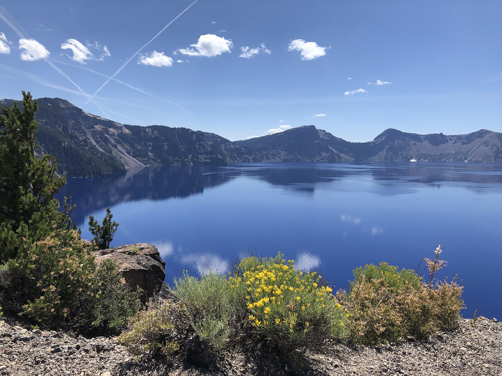A broad blue view of Crater Lake from the caldera rim