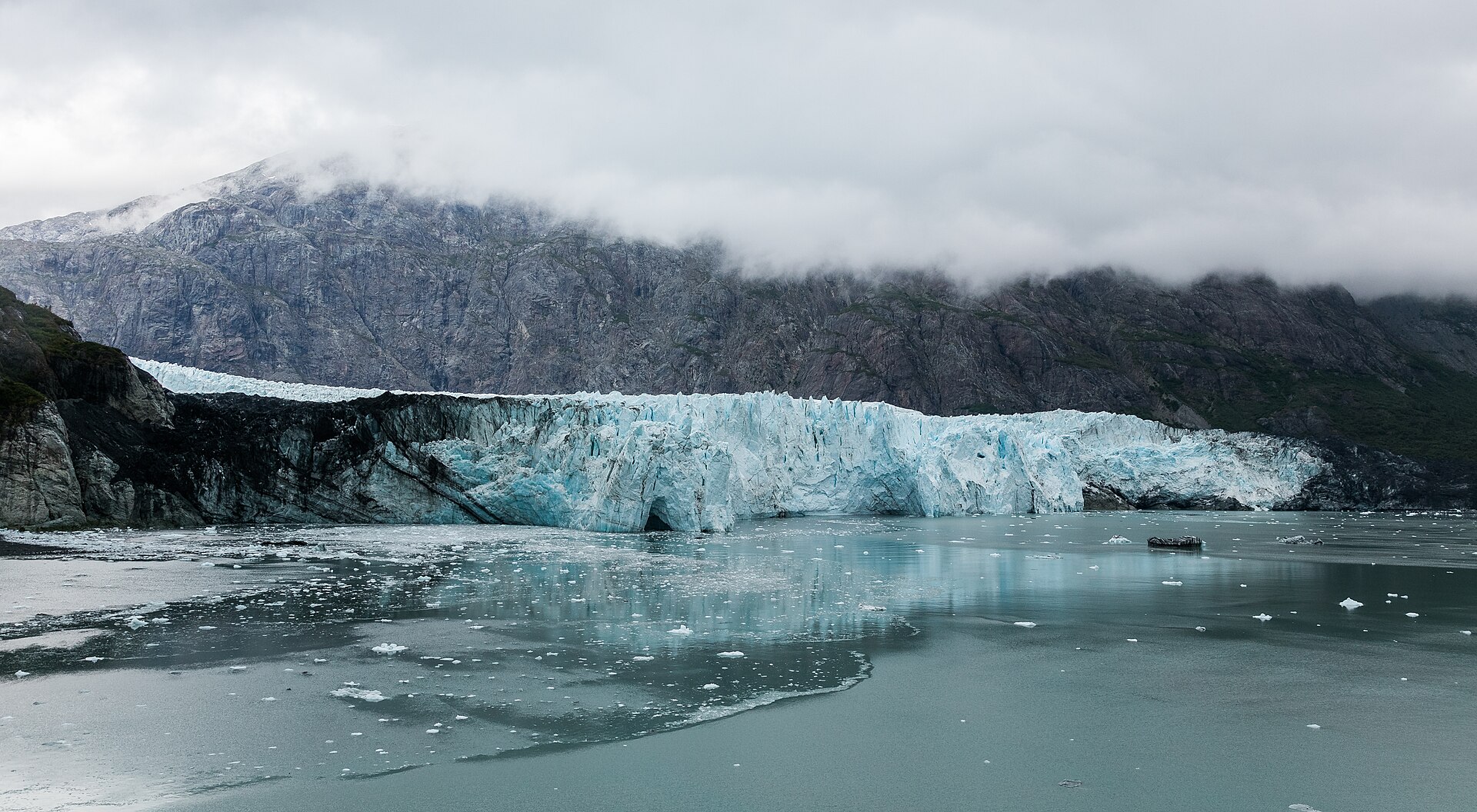 The blue face of Margerie Glacier meeting tidewater in Glacier Bay