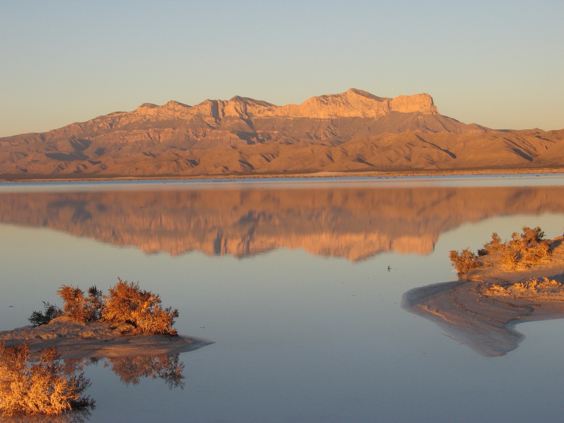 A mountain vista across the salt lake west of the Guadalupe Mountains