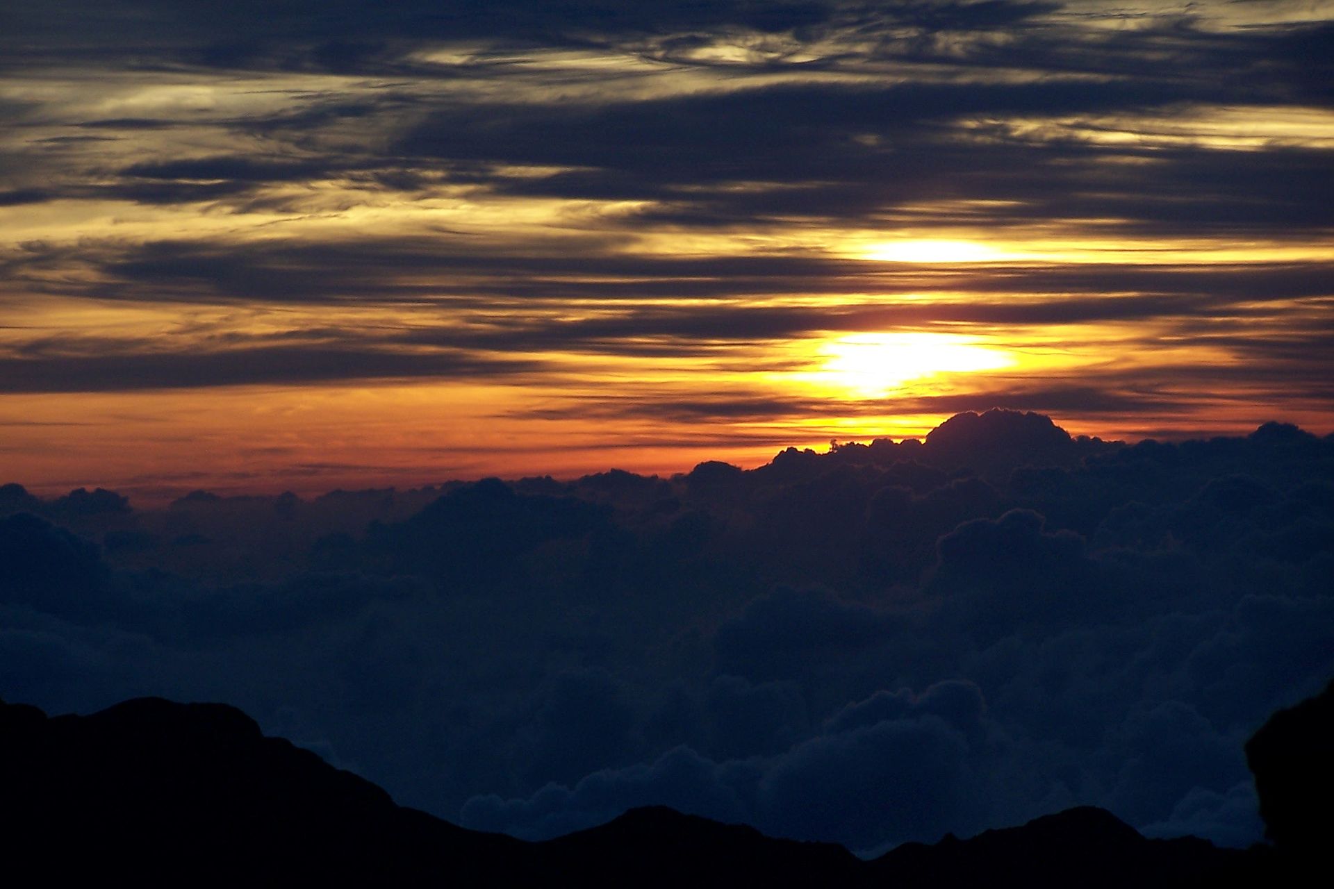 Sunrise above the clouds from the Haleakala summit