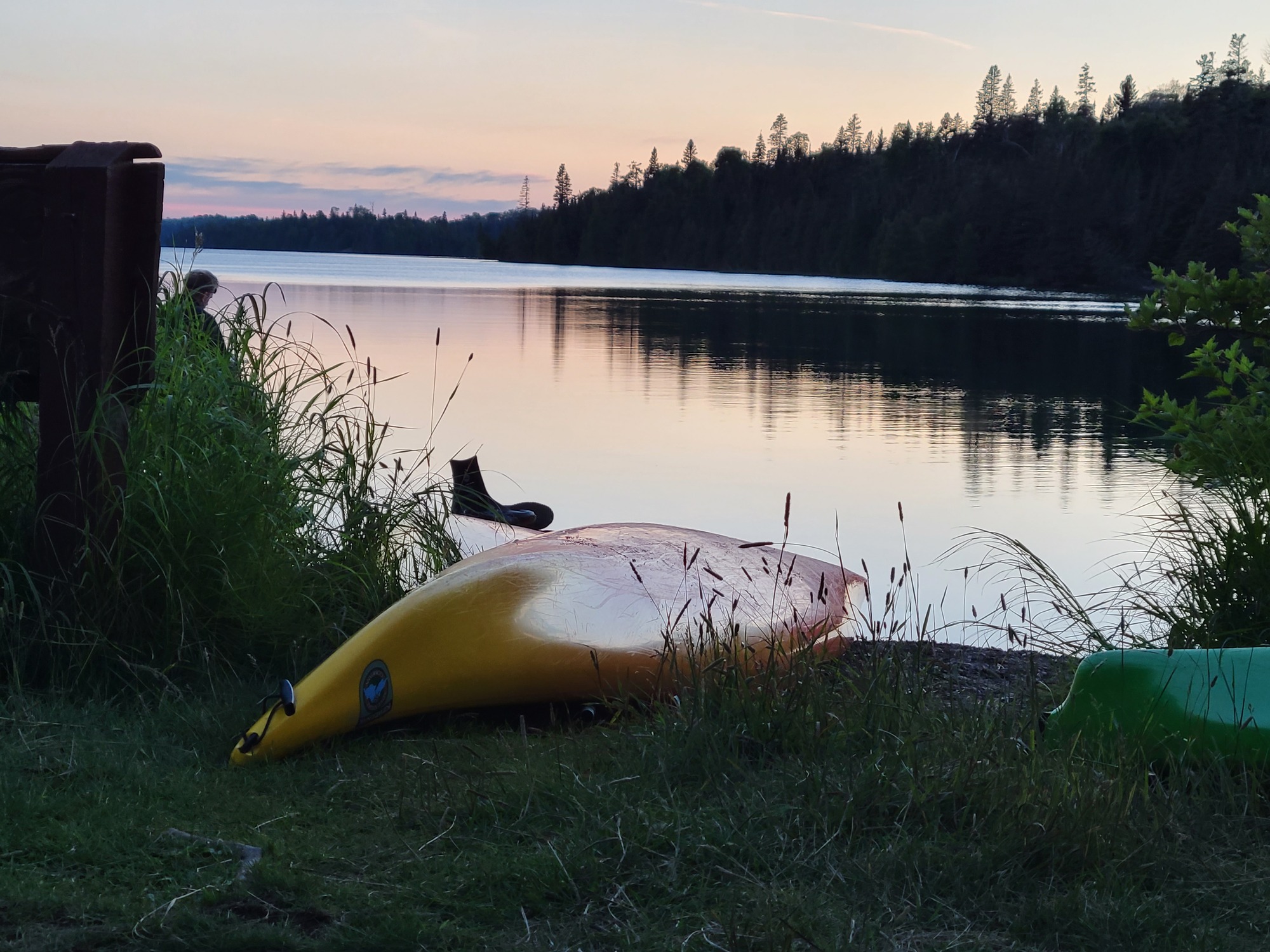 A kayaker paddling Duncan Bay Narrows on Isle Royale