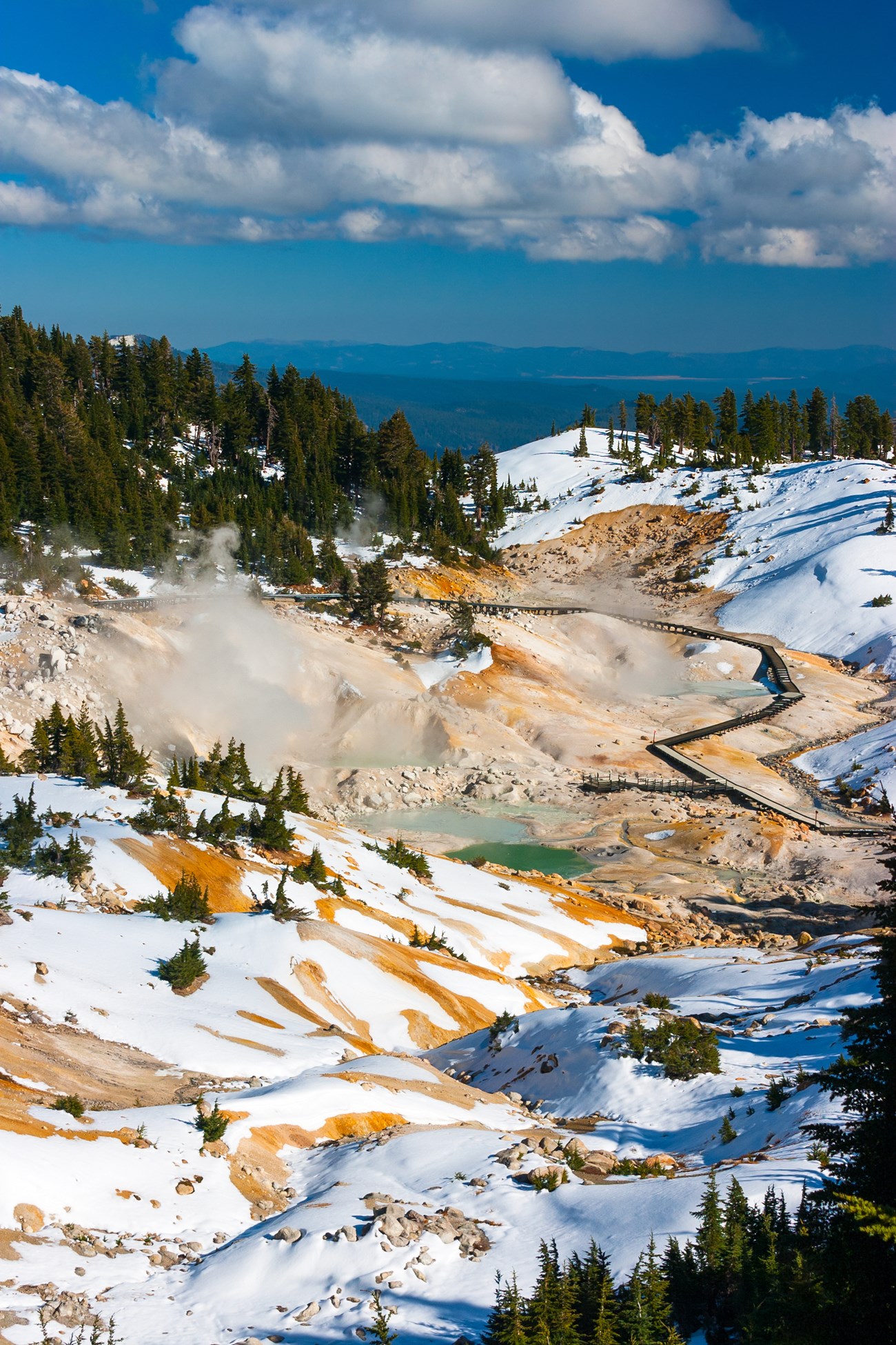 Boardwalk through the steaming hydrothermal basin at Bumpass Hell