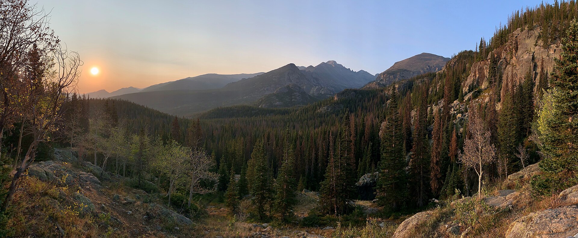 Longs Peak catching sunrise above the Dream Lake trail